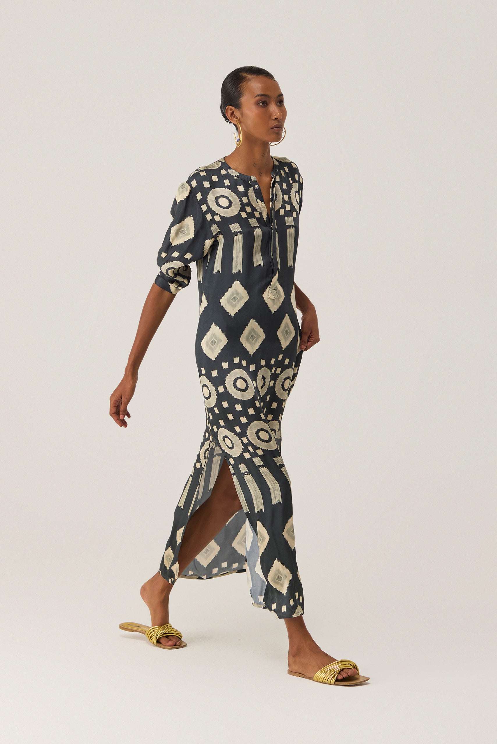 ikat shirt dress COTTON IKAT SHIRT DRESS Available in rich cranberry or deep navy, this fresh twist on our popular utility shape features a new pure cotton fabric woven with an exclusive ikat motif, making